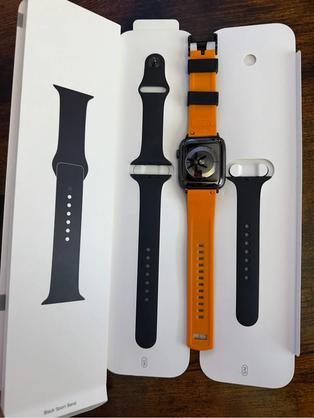 Apple Black Smartwatch with Black Silicone Band and White Magnetic Charger